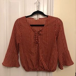 Rust orange bell sleeve crop top